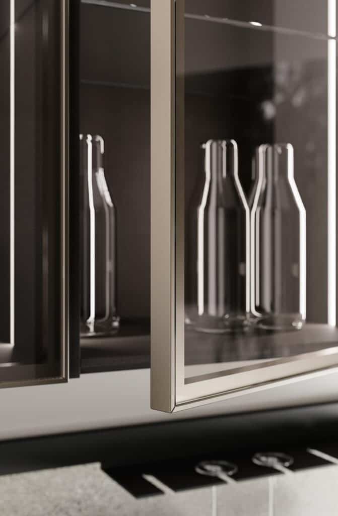 Glass cabinet with bottles inside and a modern metallic frame.