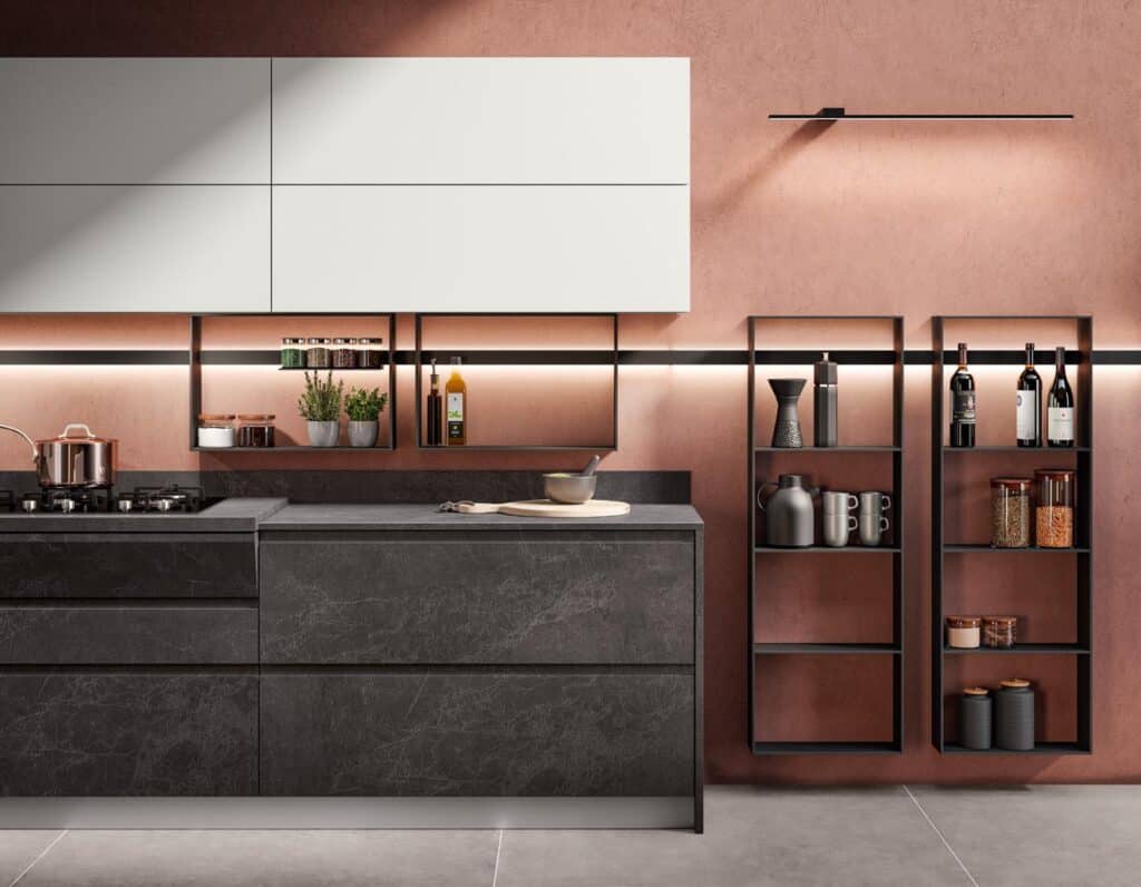 Modern kitchen with dark stone countertops, open shelving, and wall-mounted cabinets, featuring a gas stove, cookware, plants, and various bottles and jars.