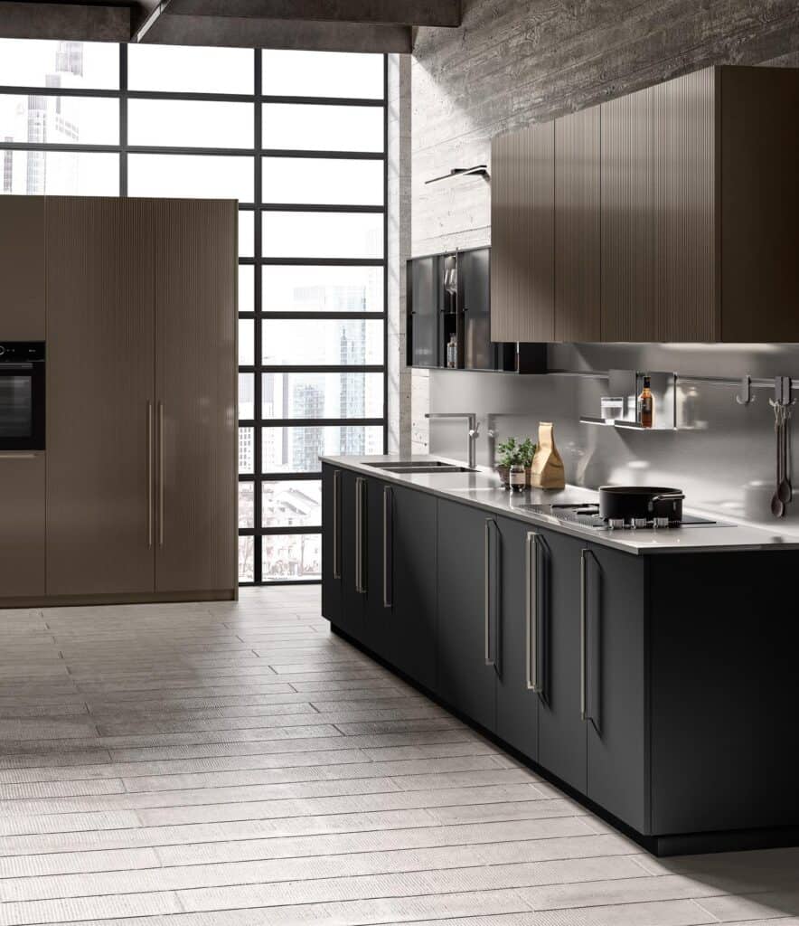 Modern kitchen interior with sleek cabinetry, large industrial windows, and a city view.