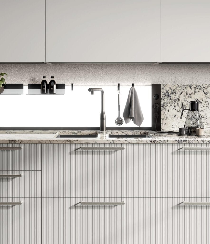 Modern kitchen with textured cabinetry, marble countertop, and backsplash. Features a sleek faucet, hanging utensils, and various kitchen items.