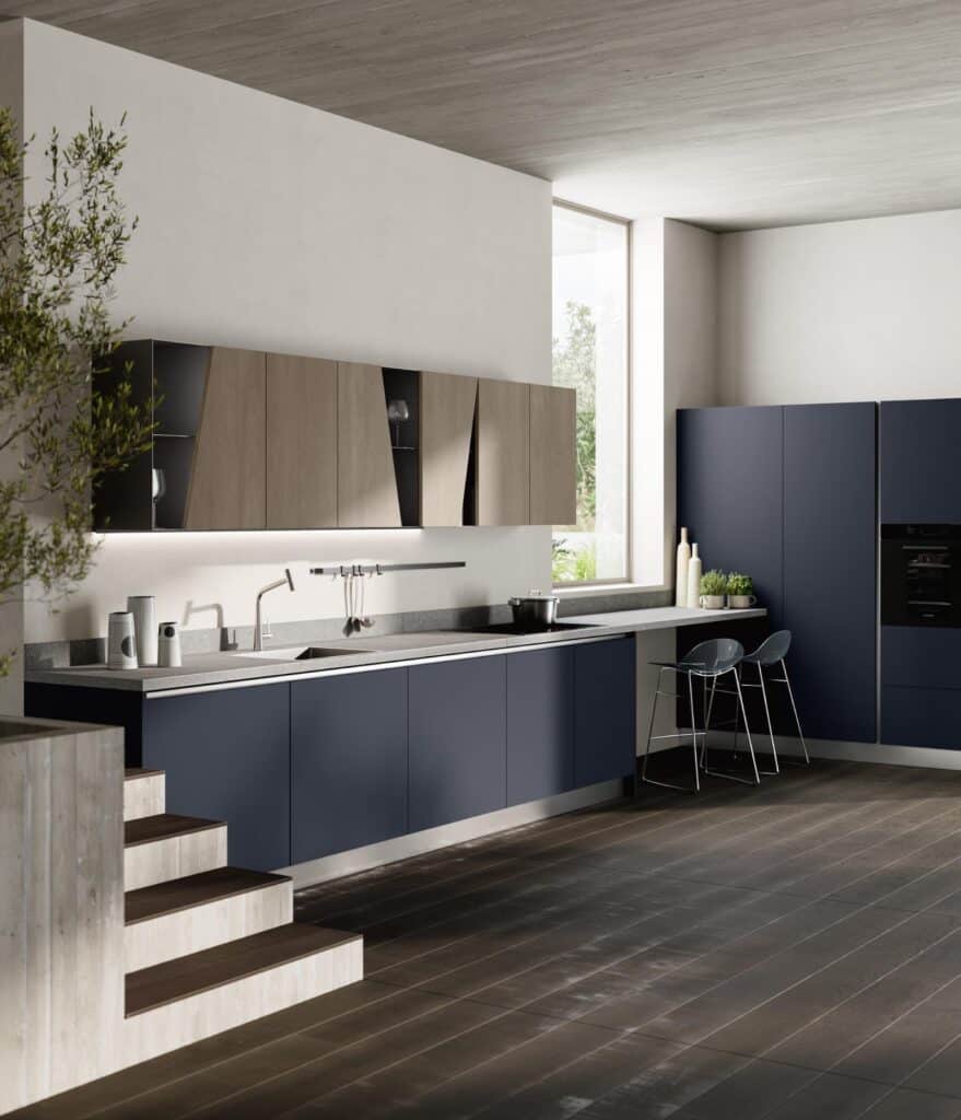 Modern kitchen with dark blue cabinets, light wood upper cabinets, a sink, and a large window.