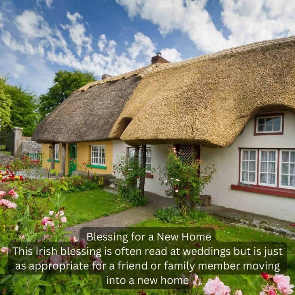 Thatched roof cottage in Ireland with colorful flowers and lush greenery.