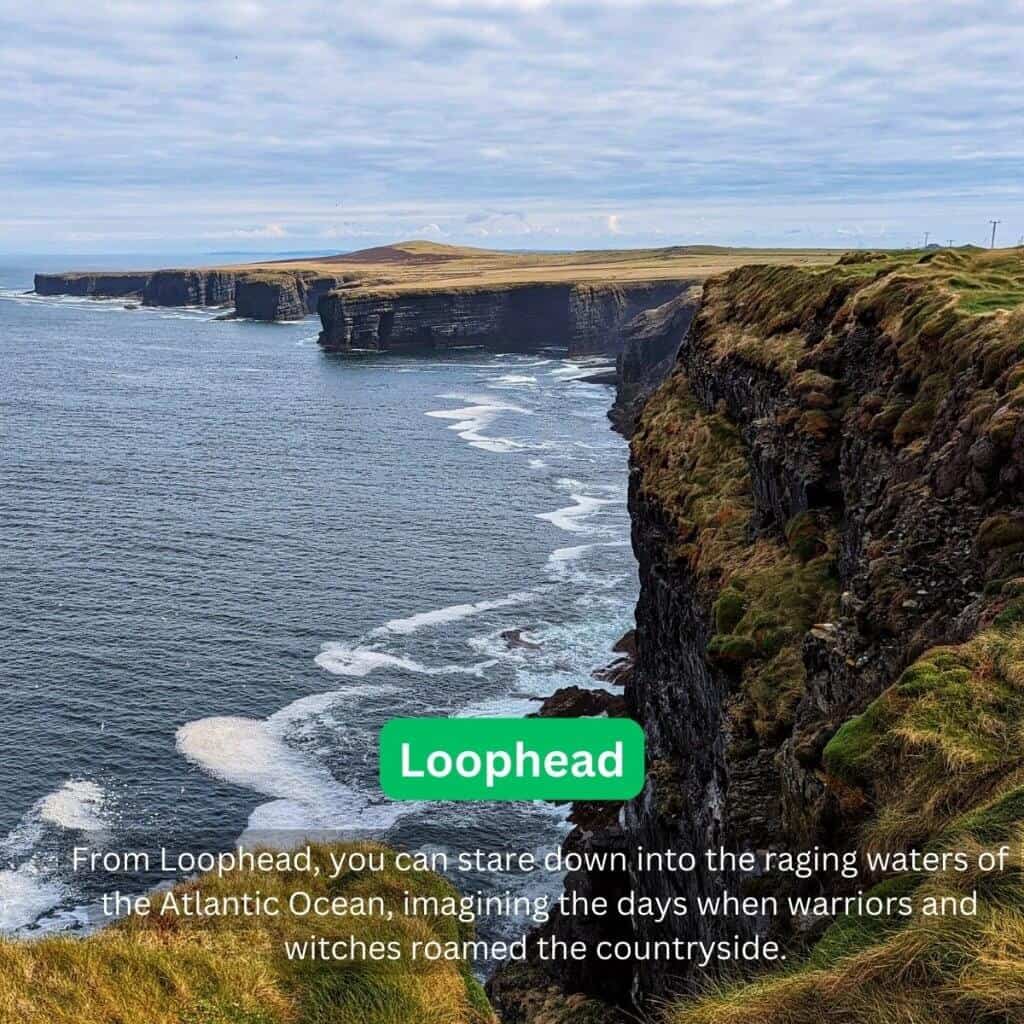 Cliffs of Moher along the Atlantic Ocean in Ireland, showcasing rugged coastline and natural beauty.