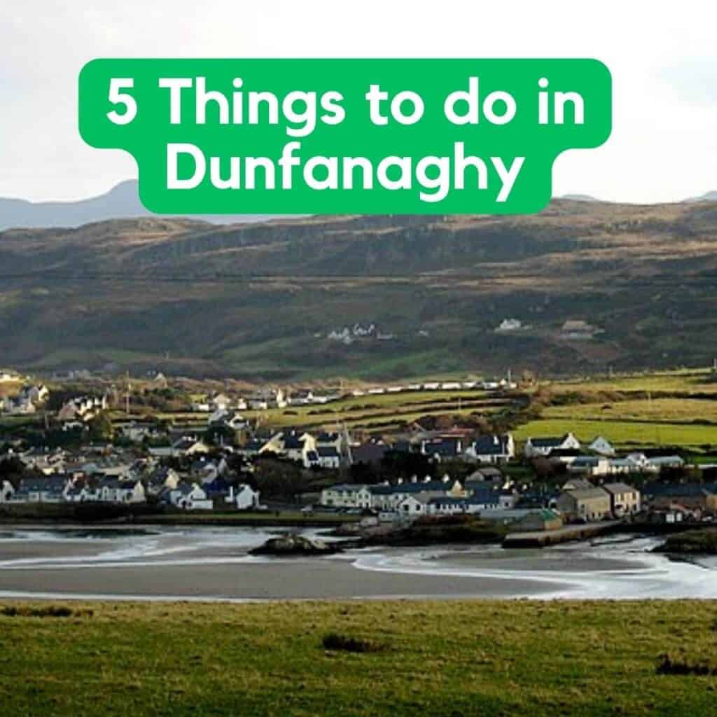 Scenic view of Dunfanagy with rolling hills and quaint houses in Ireland.