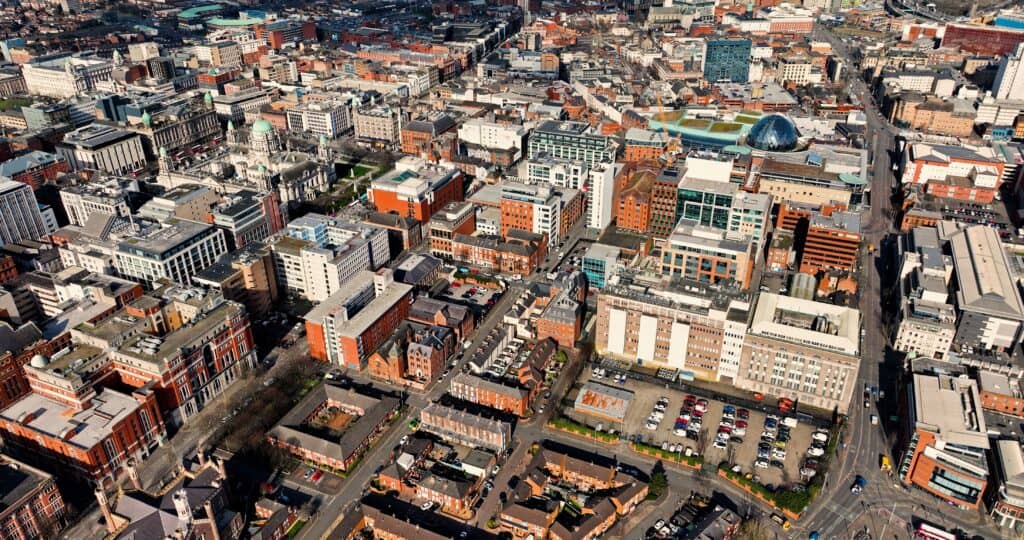 Aerial view showcasing the architectural skyline of Belfast city center in Northern Ireland.