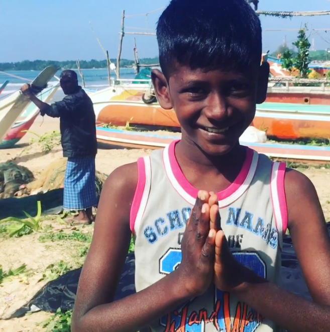 A young Buddhist boy in Weligama, Sri Lanka A young Buddhist boy in Weligama, Sri Lanka