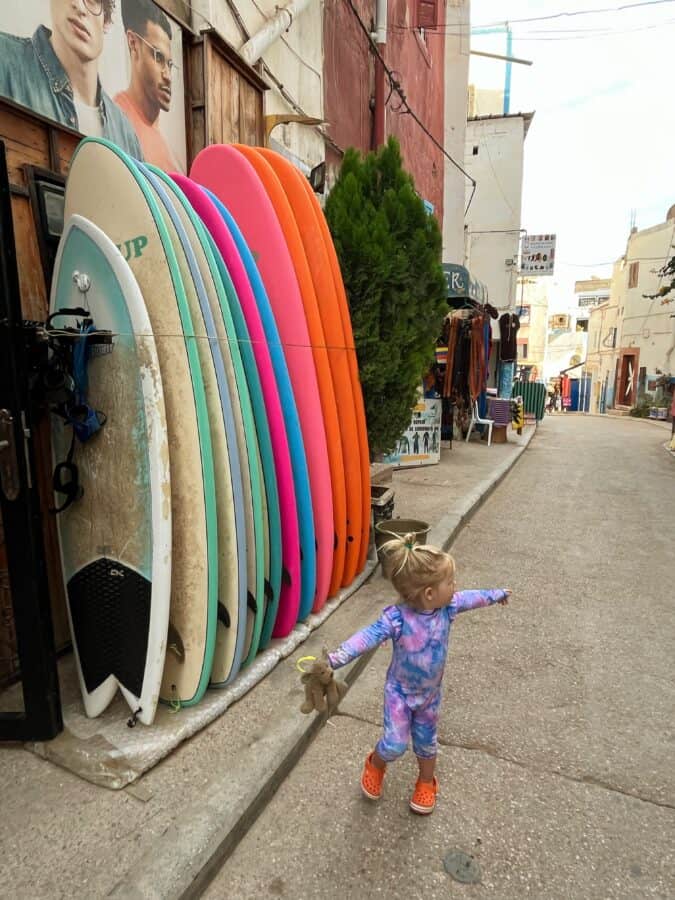 Surf boards and little girl