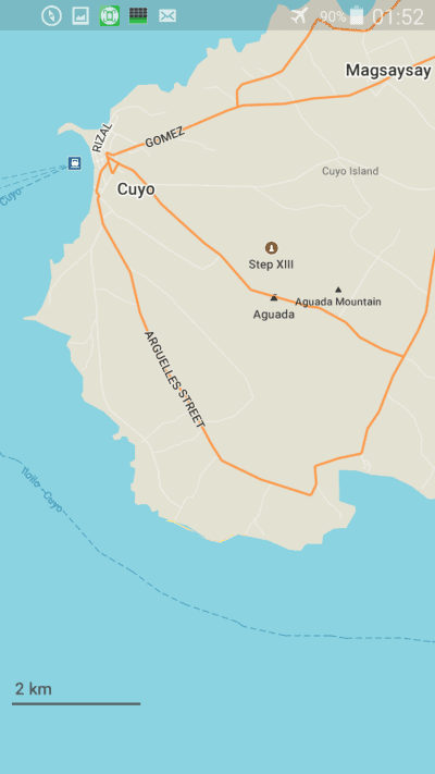 Map of Cuyo Island highlighting roads and key spots like Cuyo, Gomez, and Magsaysay. Perfect for island hopping enthusiasts, it features Aguada Mountain and Step XIII with a 2 km scale bar for distance reference.