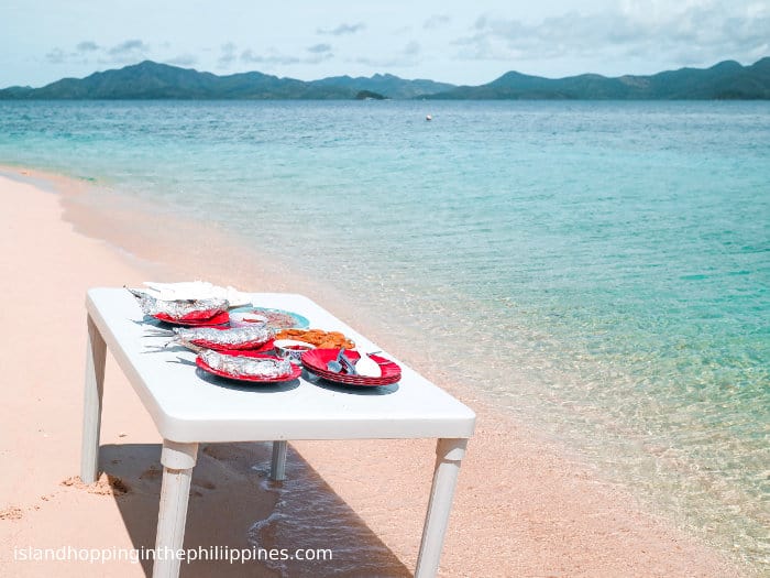 El Nido to Coron Island Hopping Boat Tours fresh coconuts