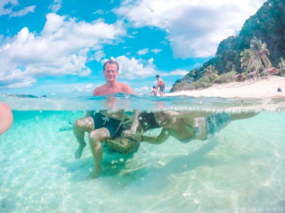 Super crystal clear waters in Exploring Caves and Shipwrecks in Black Island, Coron.