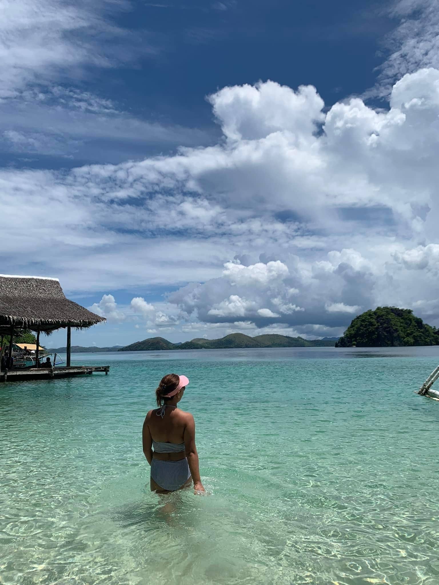 Atwayan Beach in Coron island hopping boat tour wading into the water