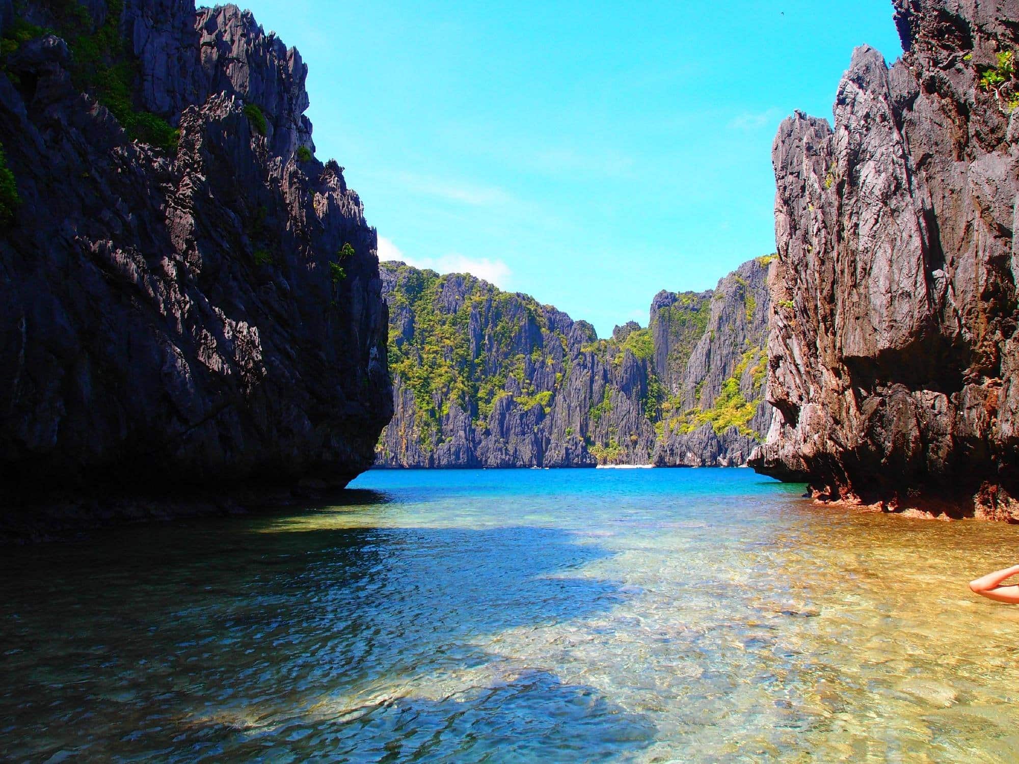 Payong payong beach El nido palawan private tour shallow waters between two big cliffs