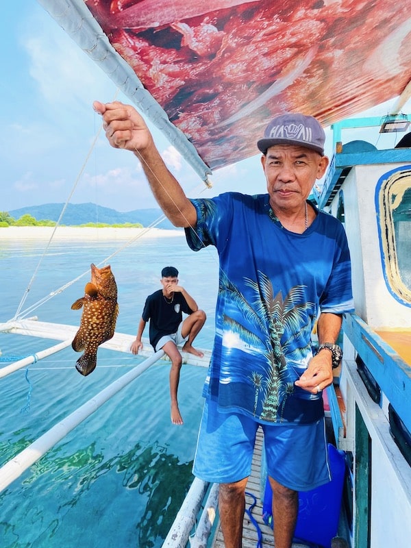 kate island hopping boat tour review catching fish