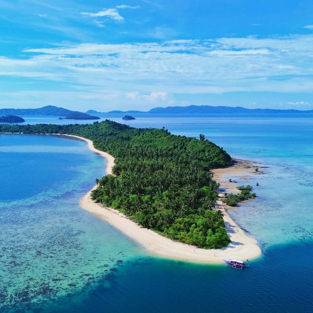 Port Barton island with lush greenery and sandy beaches in the Philippines.