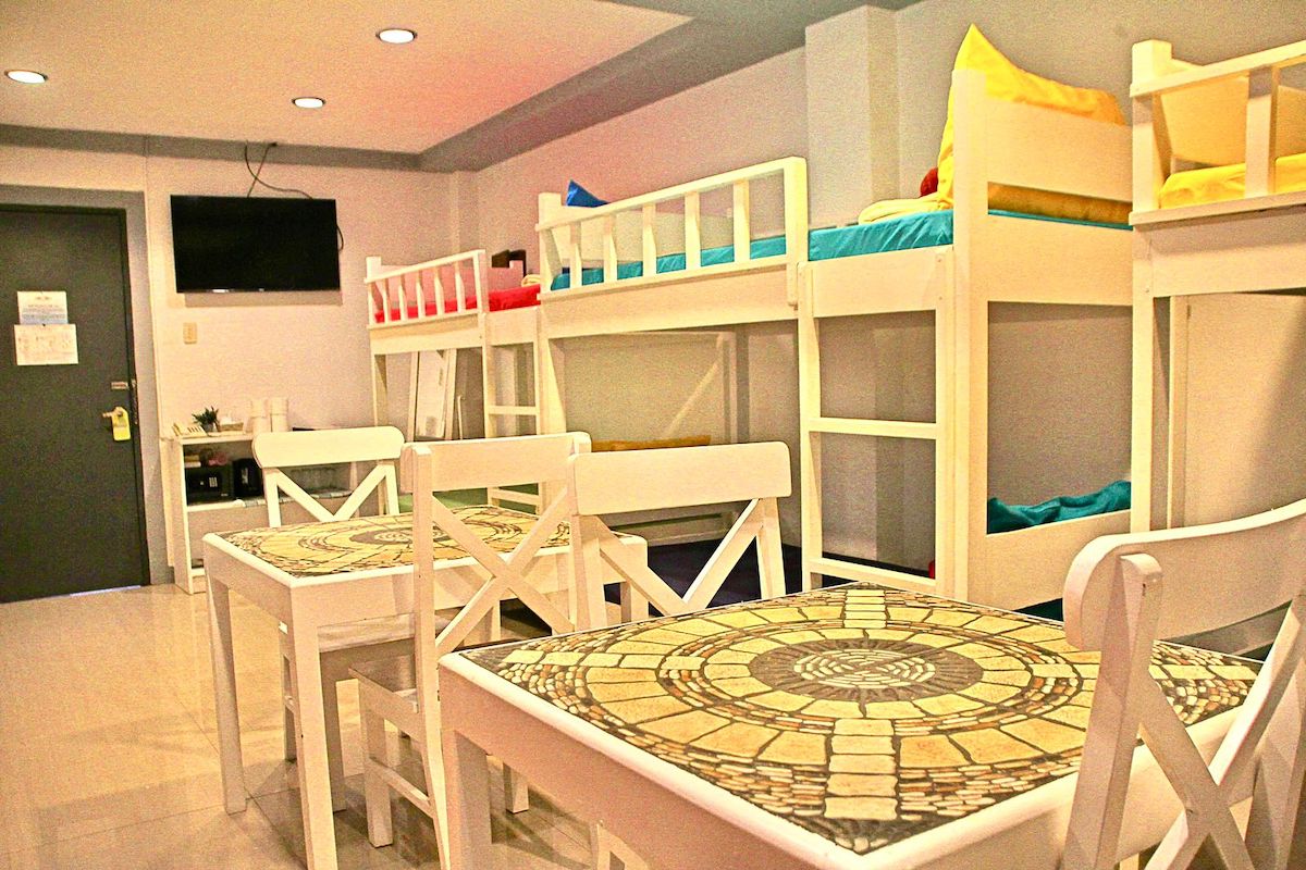 bunk room bunk room of El NIdo hotel, island hopping tours