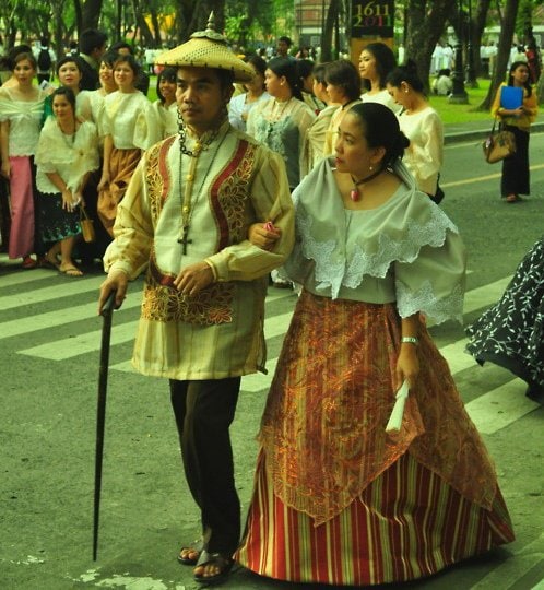 traditional filipino clothing Colorful Filipino Festival attire featuring traditional clothing and accessories.