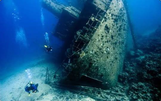 Underwater shipwreck in the Philippines perfect for diving adventures. Explore marine life around sunken ships.