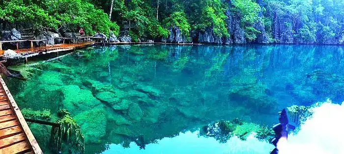 Stunning clear waters at Hidden Lagoon, Palawan, Philippines, perfect for island hopping adventures.