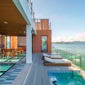 Stunning beachfront view from a modern island resort in the Philippines with a private pool and ocean access.