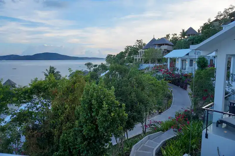 Stunning island villas overlooking the sea in the Philippines. Perfect tropical escape with lush greenery and ocean views.