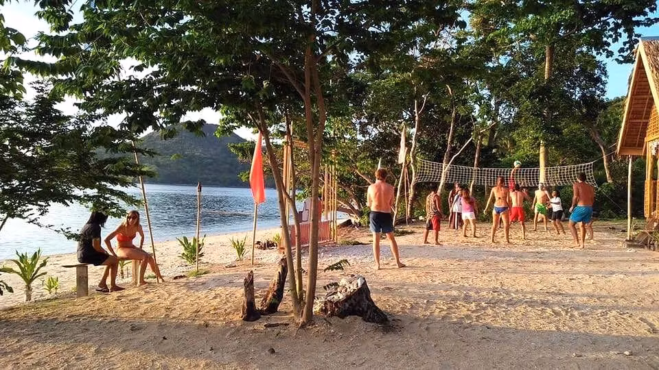 linapacan tourists camp group tour volleyball on beach