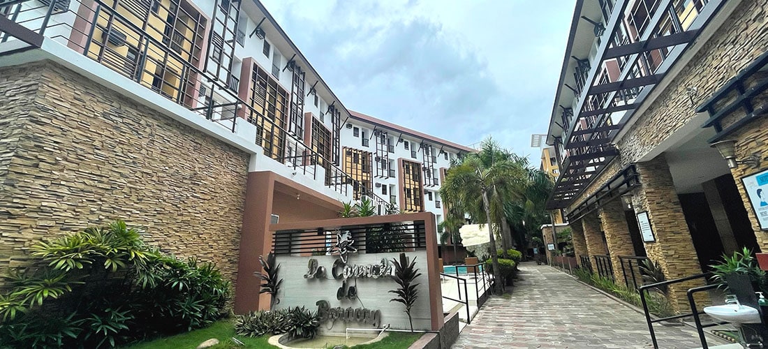 Beautiful resort with tropical surroundings inside hotel grounds.