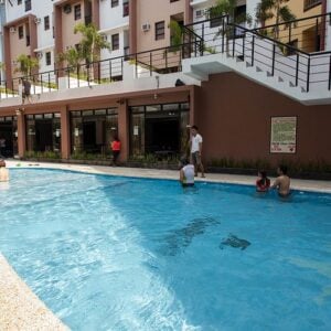Pool area at a Philippines hotel, perfect for relaxation.