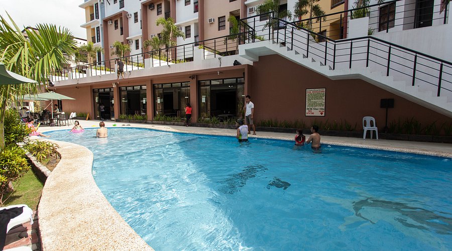 Pool area at a Philippines hotel, perfect for relaxation.