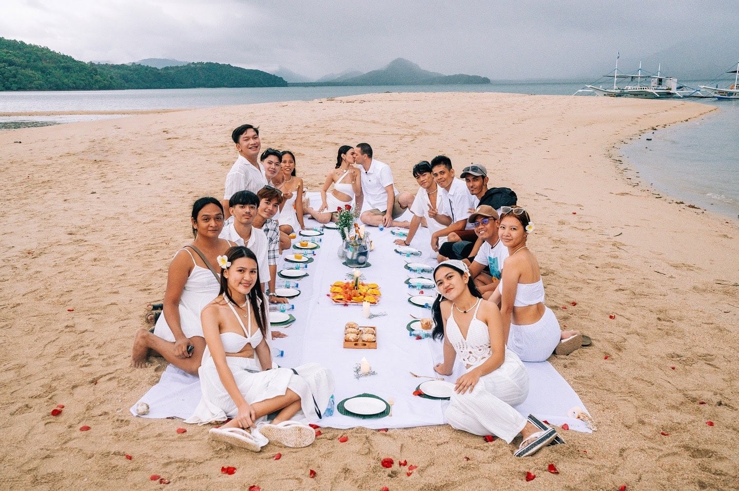 Beach wedding celebration in El Nido, Philippines with friends and family.