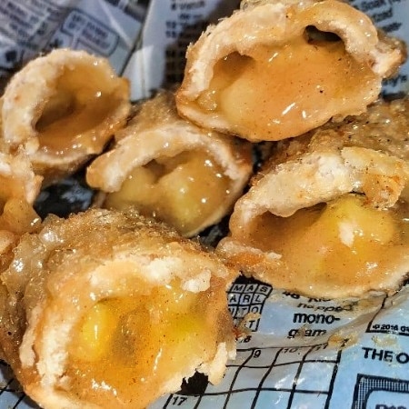 Creamy deep-fried cheese bombs with gooey melted cheese filling, perfect for snack or appetizer.