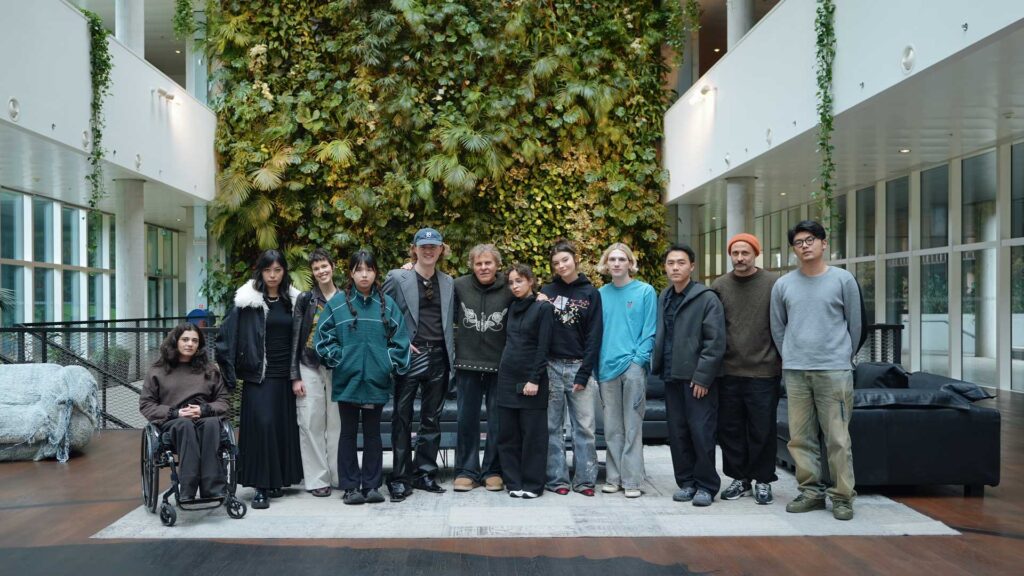 a group of people standing next to each other