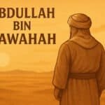 Abdullah bin Rawahah, shown from behind wearing traditional Middle Eastern attire and a turban, standing in a vast desert landscape at sunset, with his name ‘Abdullah Bin Rawahah’ in bold lettering on the left.