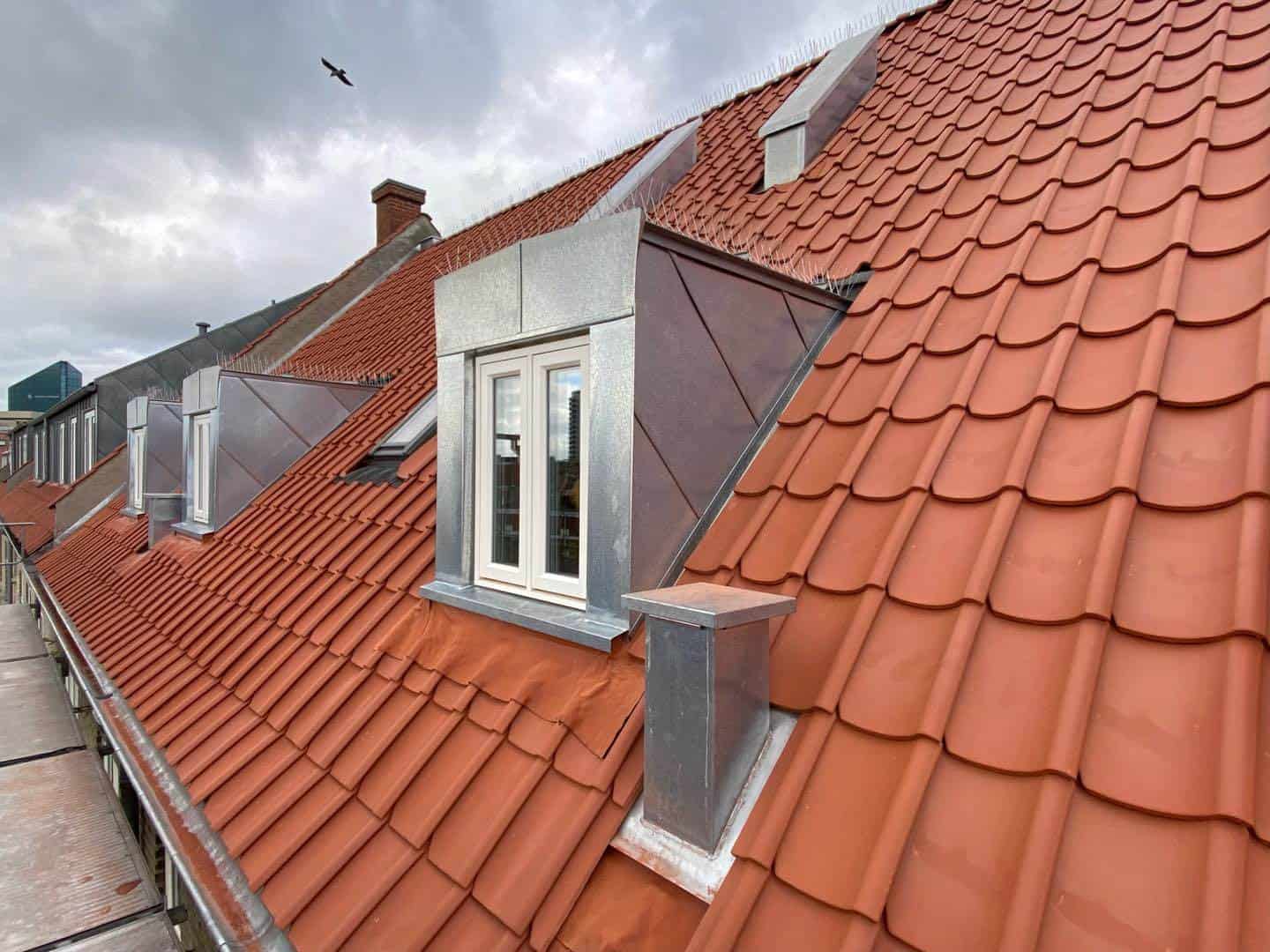Tagrender og tagrenovering på fin ejendom midt i Aarhus.