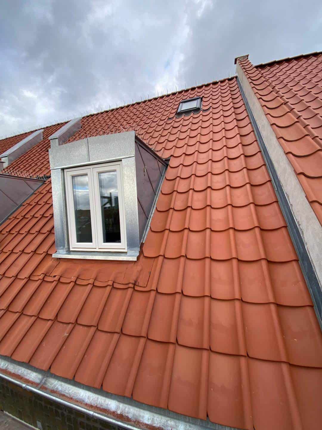Nyt tag med tagvindue på fin ejendom midt i Aarhus, udført af Jakob Tømrerfirma A/S.