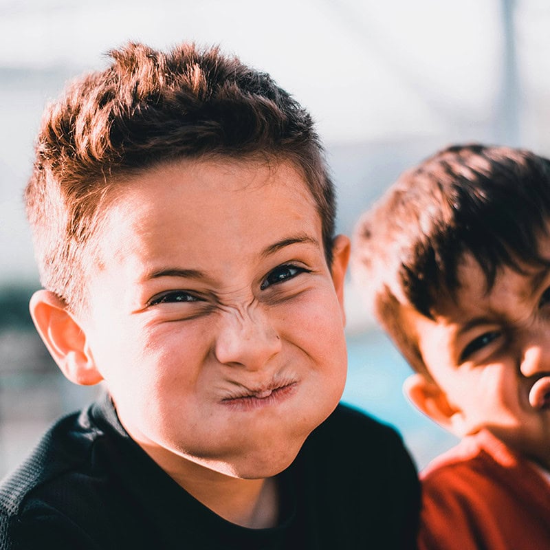 boys making a funny face