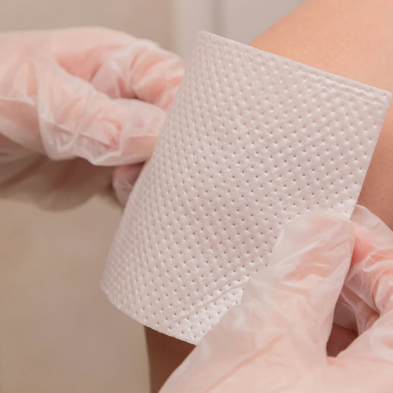 First aid bandaging gauze over a knee