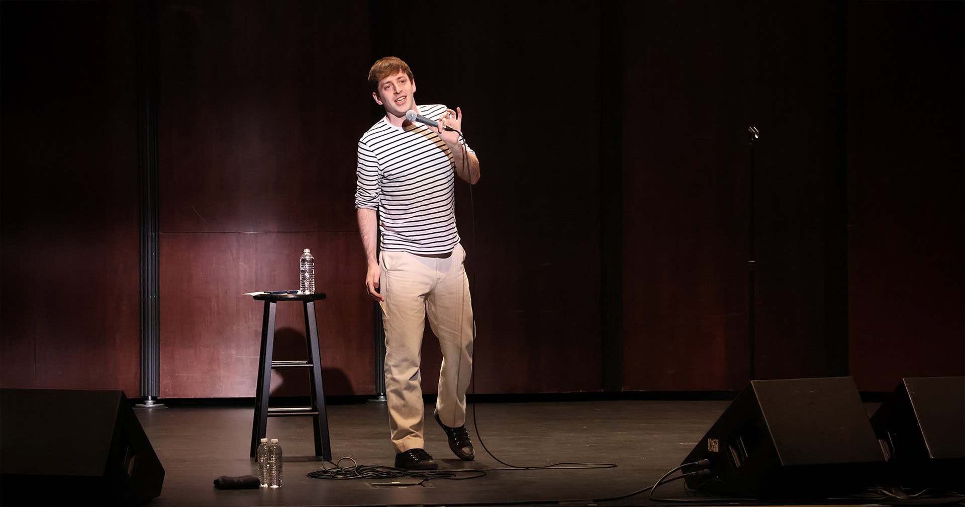 Alex Edelman on stage