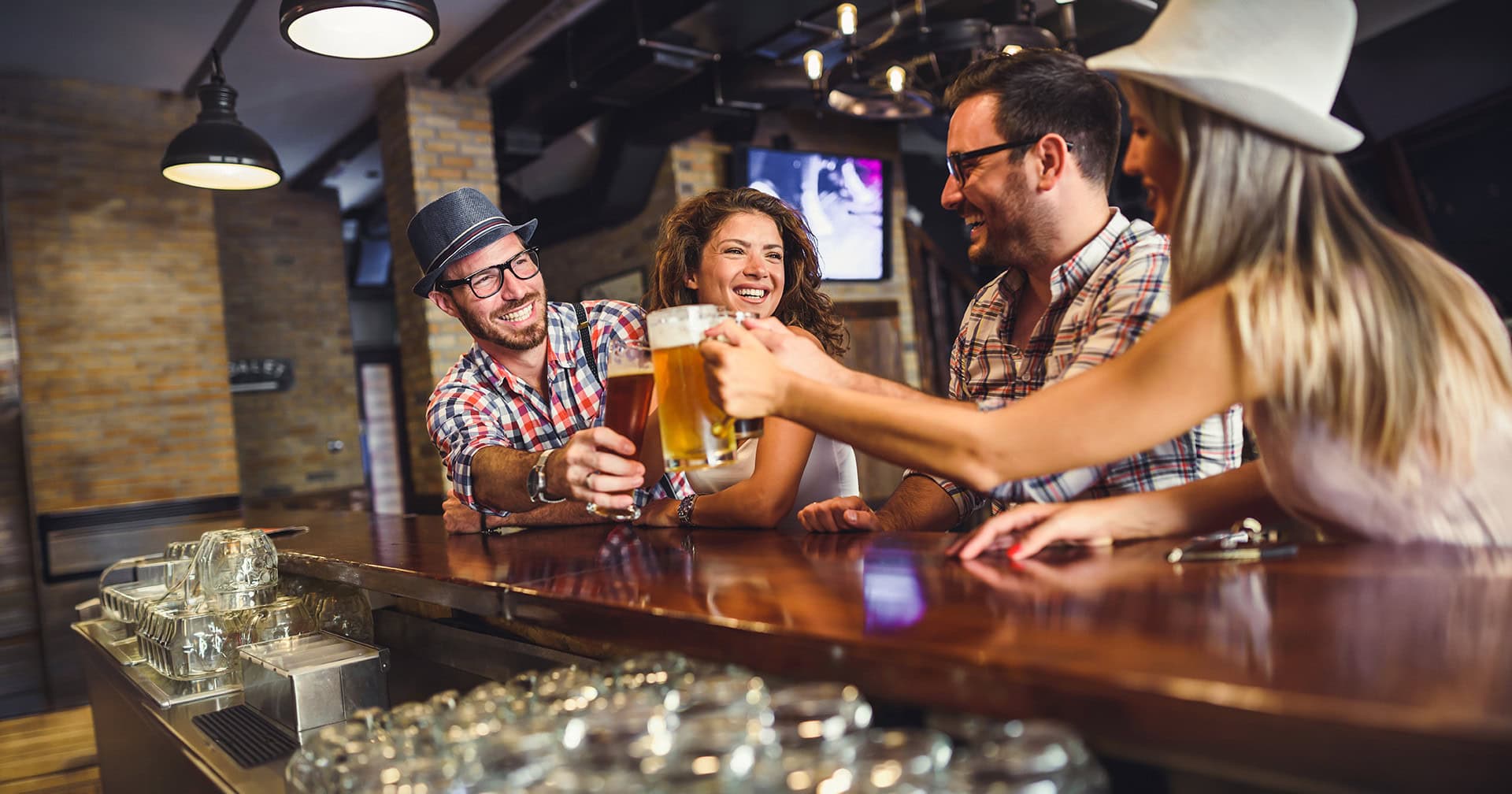 A group of people enjoying beer together