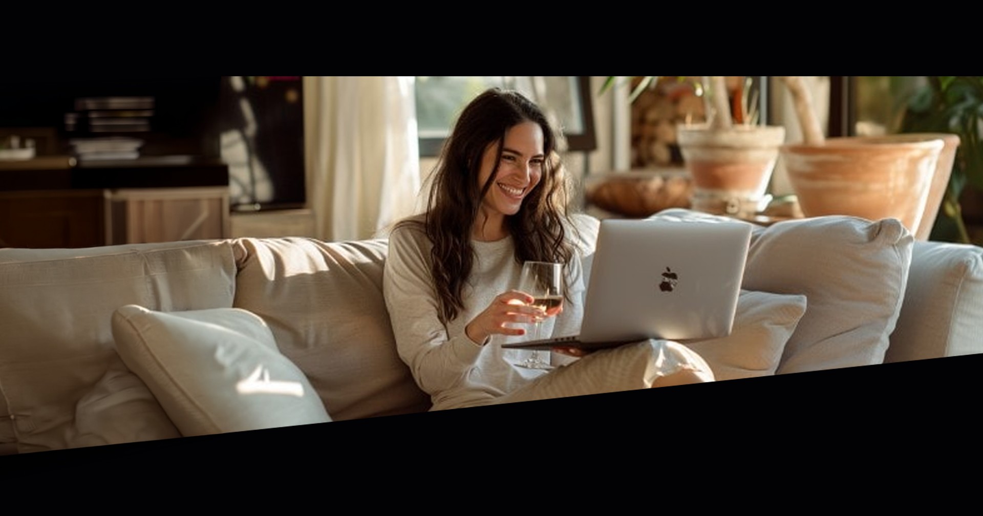 young woman on speed date couch laptop and wine