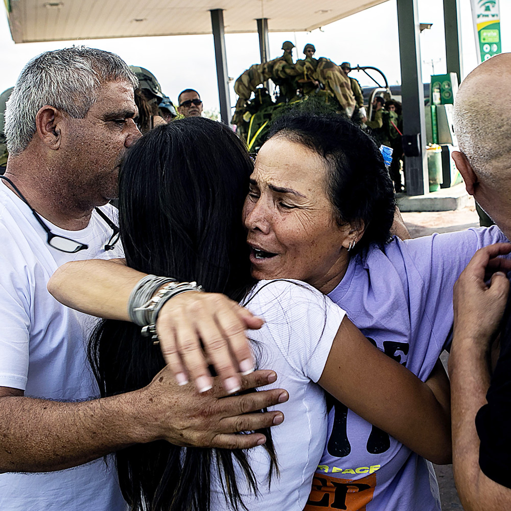 Family after destruction of their home - Oct 2023 - Credit.AG