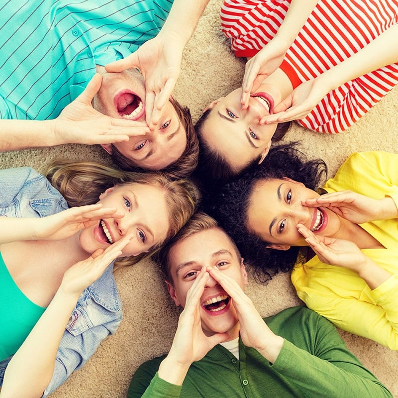 Teens Yelling in a Circle on the Floor