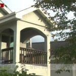 남양주 별장 흉기 피습 - YTN 리포트 화면 중 남양주 별장 사건 현장 주변 외경 — 별장 진입로나 경찰 통제선이 보이는 장면