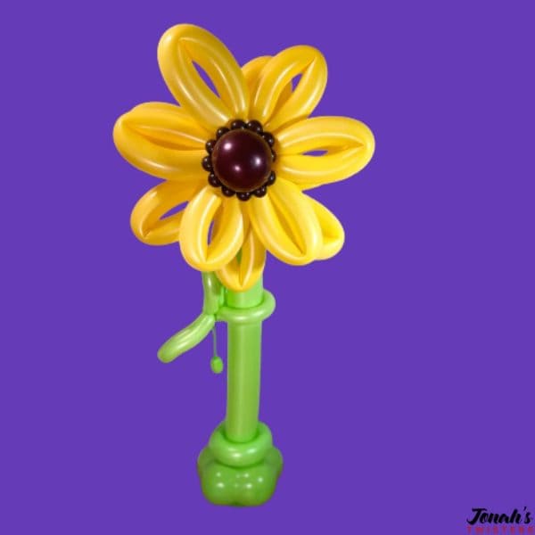 A large sunflower made out of balloons