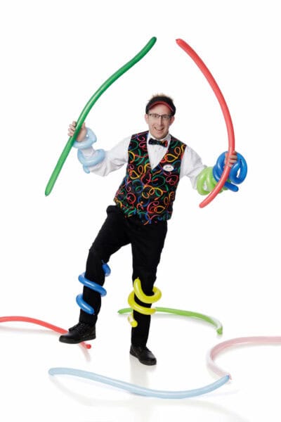 Jonah is holding balloons