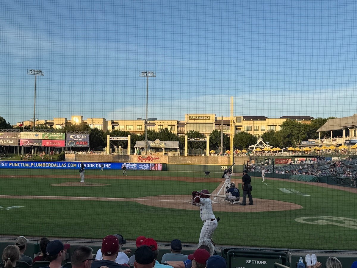 A player in the on-deck circle at a Frisco RoughRiders game.