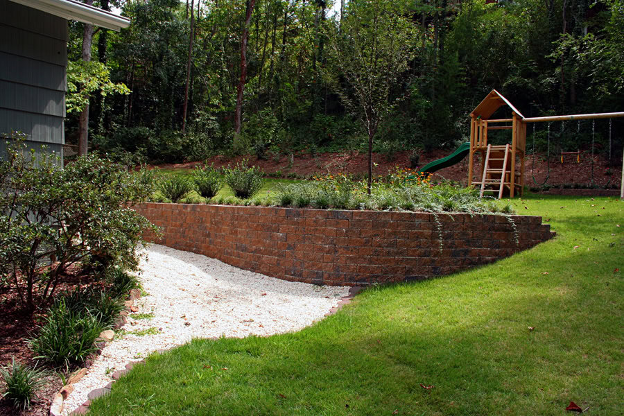 Retaining wall landscaping, garden design, outdoor living space, John Russell Landscape Architect, backyard landscape, professional landscape construction.
