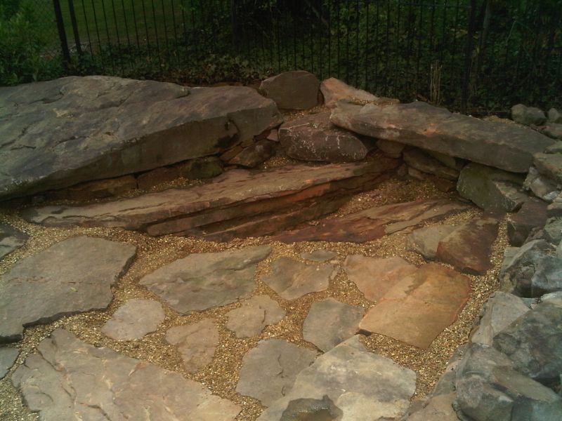 Rock landscape design for custom outdoor patios and features.