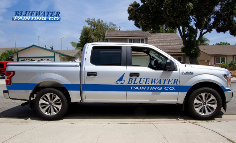 Blue Water Painting company F-150 with custom cut vinyl logos, lettering, and striping by J. Thow.