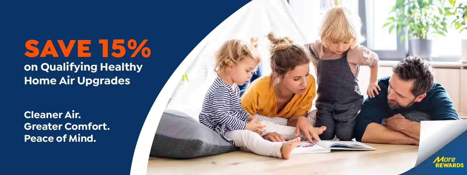 A family with two children reads a book together on the floor; learn more about us and enjoy 15% savings on healthy home air upgrades for cleaner air and comfort.
