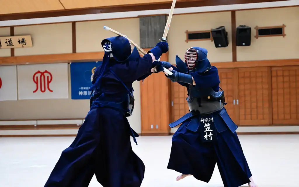 Kendo partners training with shinai